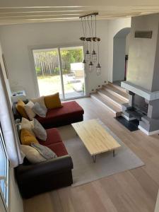 A seating area at Maison indépendante, domaine VICHY LA TOUR