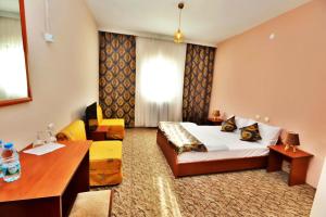 Tempat tidur dalam kamar di Karbeyaz Hotel & Resort