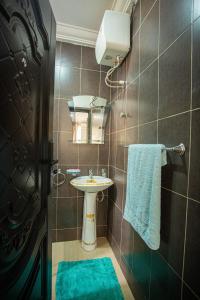 Vonios kambarys apgyvendinimo įstaigoje Accra Luxury Homes @ East Legon