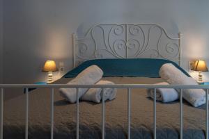 Posteľ alebo postele v izbe v ubytovaní Phos apartment