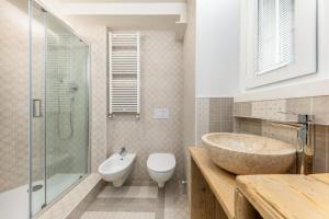 Een badkamer bij Casa da Suite Icona