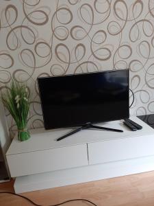 A television and/or entertainment centre at Villa Csilla elegant house