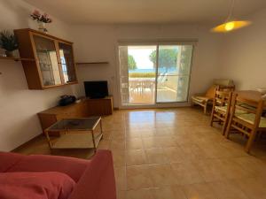 A television and/or entertainment centre at Myhost la Dorada frente al mar