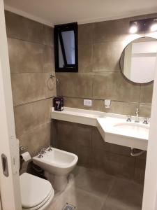 Ένα μπάνιο στο Ganesha Abasto Apartments +23 φωτογραφίες