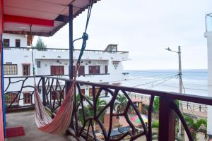 Un balcón o terraza de Arrecife Montañita Hostal