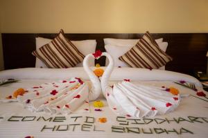 Rúm í herbergi á Siddhartha Boutique Hotel, Boudha