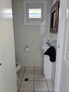 Kylpyhuone majoituspaikassa Villa 36