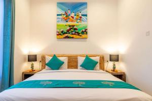 Ein Bett oder Betten in einem Zimmer der Unterkunft Villa Alhena