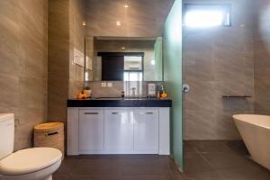 Ein Badezimmer in der Unterkunft Villa Alhena