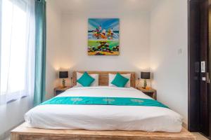 Ein Bett oder Betten in einem Zimmer der Unterkunft Villa Alhena