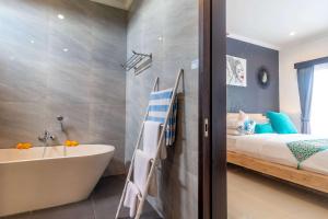 Ein Bett oder Betten in einem Zimmer der Unterkunft Villa Alhena