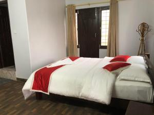 Letto o letti in una camera di Hotel Bhagya