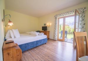 Кровать или кровати в номере Vital Hotel Stoderhof
