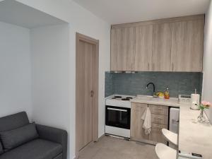 Kuchyň nebo kuchyňský kout v ubytování Estrella Rooms