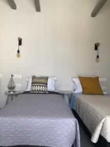 Voodi või voodid majutusasutuse Afrodete Hotel toas