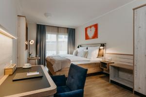 Katil atau katil-katil dalam bilik di Hotel Alter Muschelsaal +23 gambar