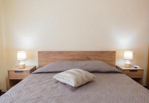 Postel nebo postele na pokoji v ubytování Cozy Platytera apartment