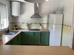 A kitchen or kitchenette at LA ANTIGUA CASA DEL ASTRONOMO Casa Rural