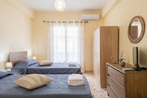 Postel nebo postele na pokoji v ubytování Cozy Platytera apartment