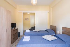 Postel nebo postele na pokoji v ubytování Cozy Platytera apartment