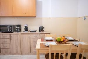 Kuchyň nebo kuchyňský kout v ubytování Cozy Platytera apartment