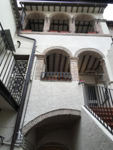 an external view of a building with windows and balconies at I 3 FRATELLI in Foligno