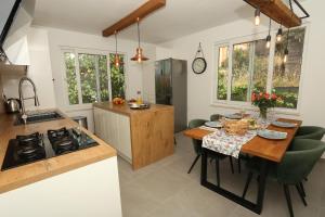 Η κουζίνα ή μικρή κουζίνα στο Apartman Luce