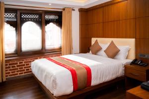 Hotel Kailash Kutee客房内的一张或多张床位