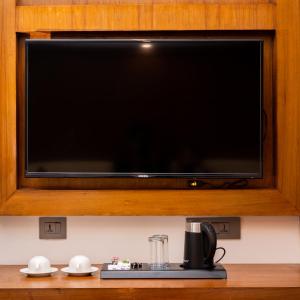 Kuchyň nebo kuchyňský kout v ubytování Hotel Kailash Kutee