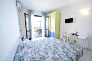Postel nebo postele na pokoji v ubytování Le sirene