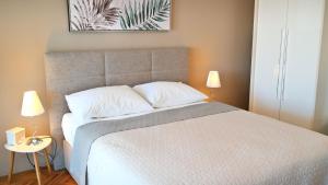 Posteľ alebo postele v izbe v ubytovaní Holiday House Holek