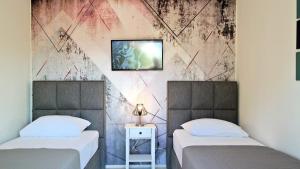 Posteľ alebo postele v izbe v ubytovaní Holiday House Holek