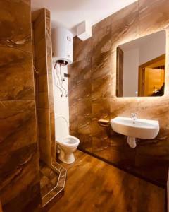 Koupelna v ubytování Apartments in Kaunas