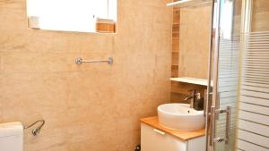 Kúpeľňa v ubytovaní Holiday House Holek