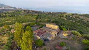 an aerial view of a house in a field at Il Prato degli Ulivi in Rocca Imperiale +13 photos
