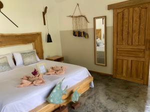Postel nebo postele na pokoji v ubytování KALUME' Eco Boutique Resort-Adult only