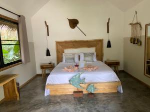 Postel nebo postele na pokoji v ubytování KALUME' Eco Boutique Resort-Adult only