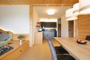 Kuchyňa alebo kuchynka v ubytovaní Chalet Village by Apart4you