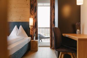 Posteľ alebo postele v izbe v ubytovaní Chalet Village by Apart4you