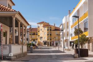 an empty street in a city with buildings at Sun Wave Apartment - Santa Cruz in Santa Cruz