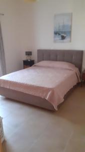 Posteľ alebo postele v izbe v ubytovaní ILIANA.APARTMENTS