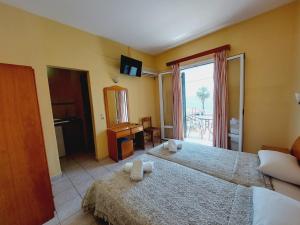 Postel nebo postele na pokoji v ubytování Cactus rooms