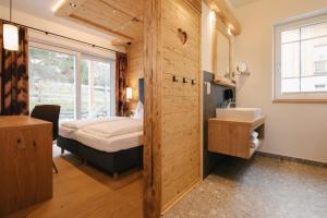 Posteľ alebo postele v izbe v ubytovaní Chalet Village by Apart4you