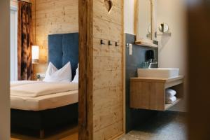 Posteľ alebo postele v izbe v ubytovaní Chalet Village by Apart4you