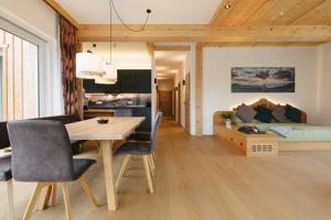 Posedenie v ubytovaní Chalet Village by Apart4you