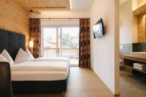 Posteľ alebo postele v izbe v ubytovaní Chalet Village by Apart4you