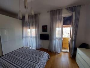 Posteľ alebo postele v izbe v ubytovaní La Casa di Cri