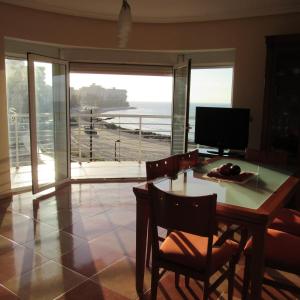 TV a/nebo společenská místnost v ubytování Edificio Montecarlo Playa San Juan