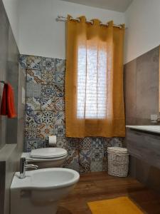 Kupaonica u objektu Casa Olivastra