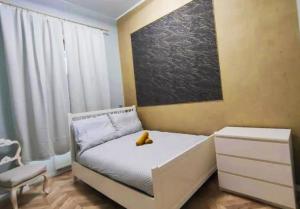 A bed or beds in a room at Park Rezydencja